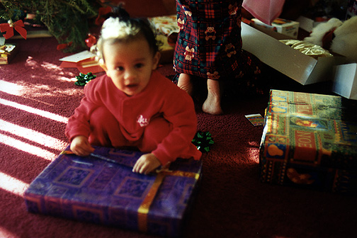 Mari unwraps a present!
