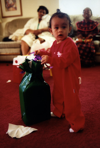Mari learns to open presents!