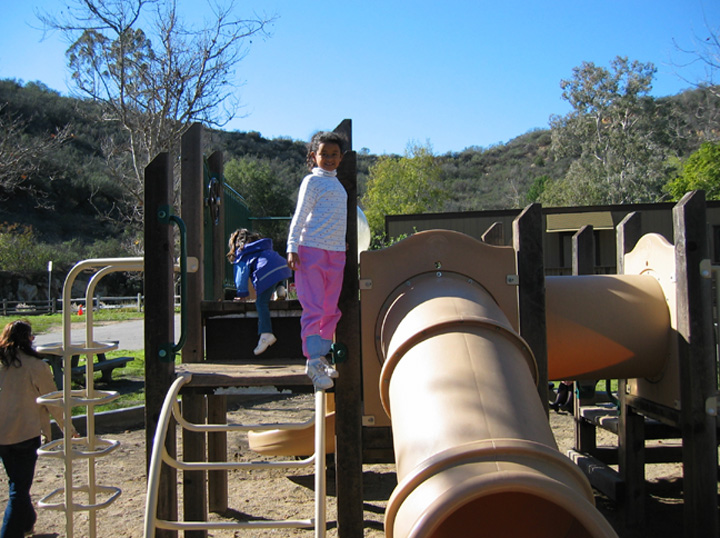 Mari tries out the playground!