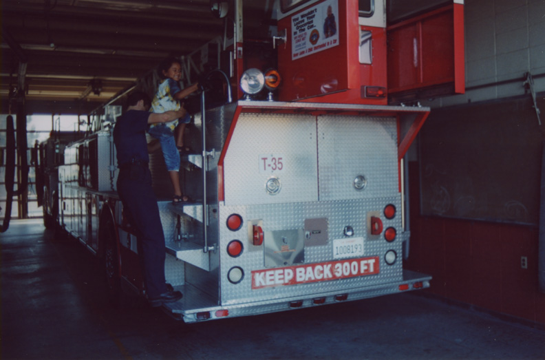 Mari nears the top of the fire engine!