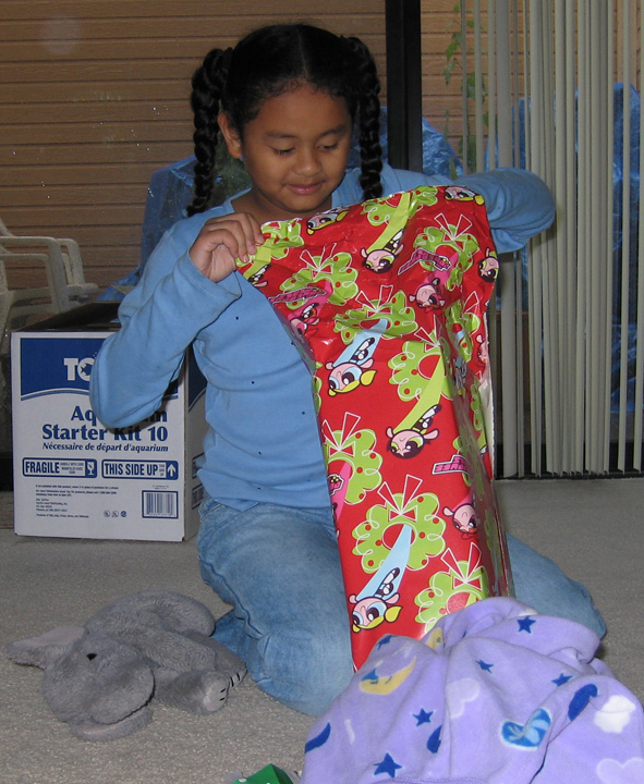 Mari opens another present from daddy!