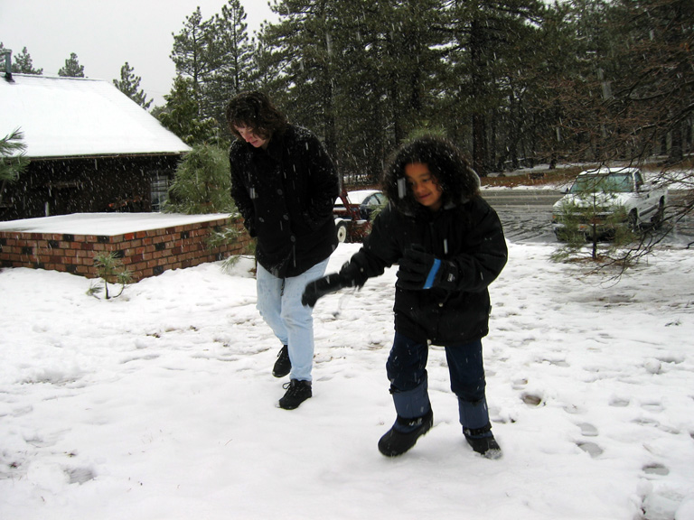 Mari plays in the snow with Maggie!