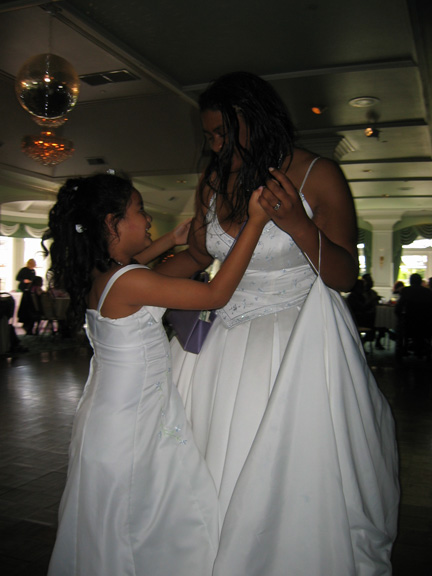 Mari does the money dance with mommy!