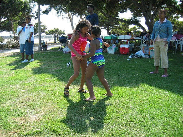 Mari and Tajah are in the water balloon race!