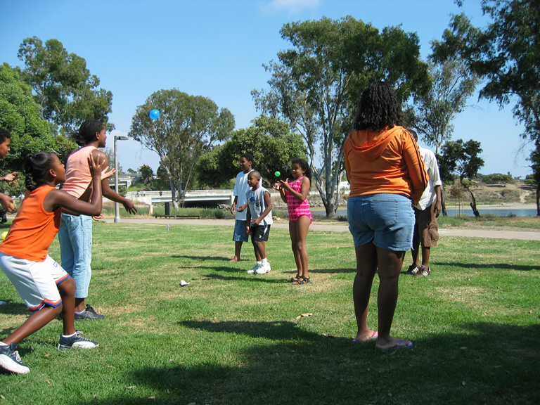 Mari is in the water balloon throwing contest!