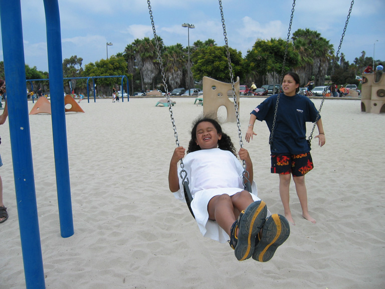 Mari plays on the swings!