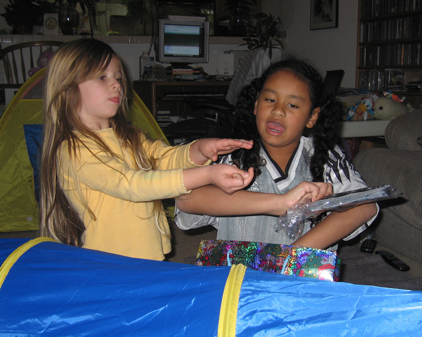 Jacque helps Mari open presents!