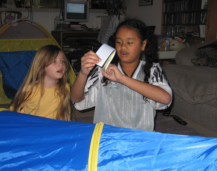Jacque helps Mari open presents!