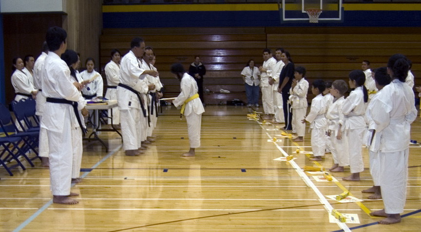 Mari gets her Diploma for the rank of 8th Kyu in Karate and Kobudo!