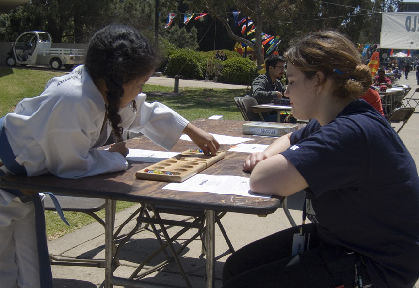 Mari plays Mancala with Jessica!
