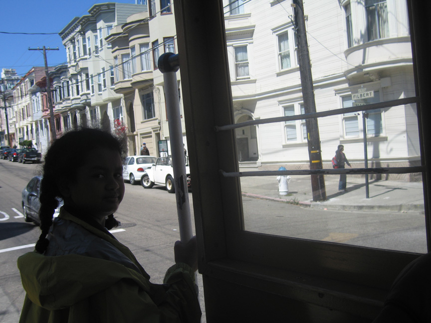Riding a cable car!
