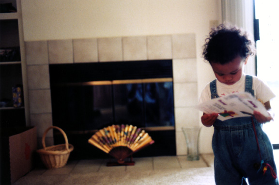 Mari reads the catalog